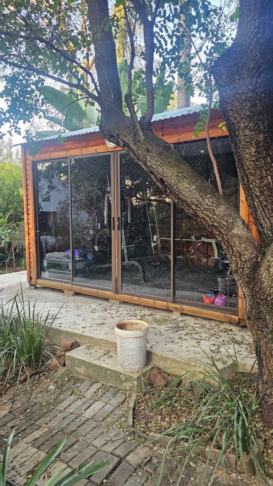 Timber garden room with full glass sliding doors